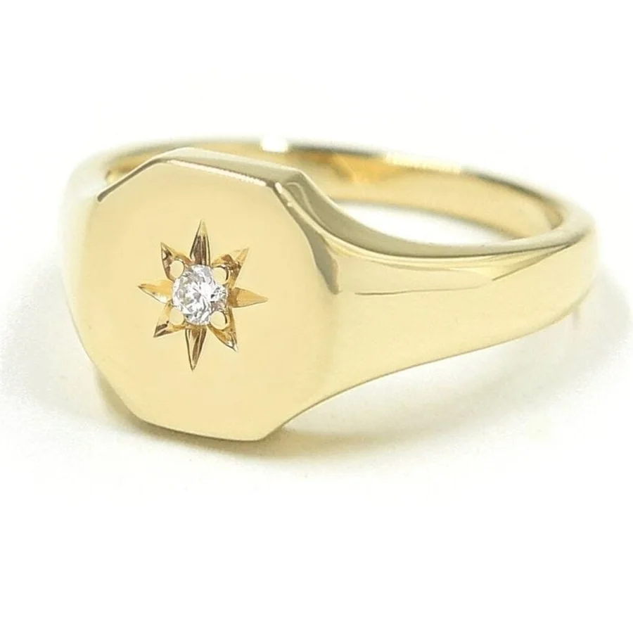 Gold Josie signet ring with a diamond set in a star by Bondeye Jewelry